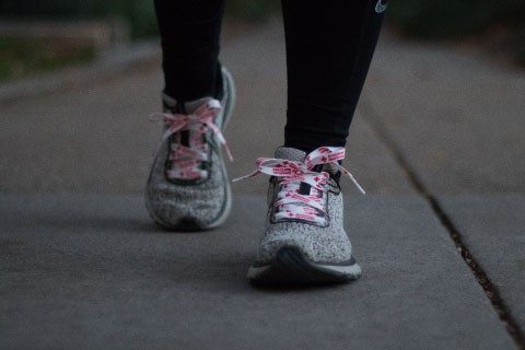A man runs a race to raise money for the Red Cross