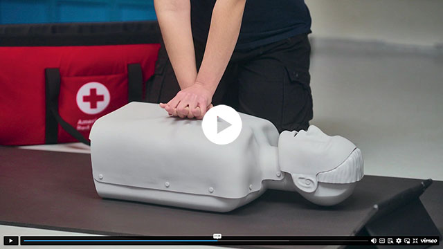 Preview image for the Red Cross SMART Manikin overview video featuring a student practicing CPR with a SMART Manikin.