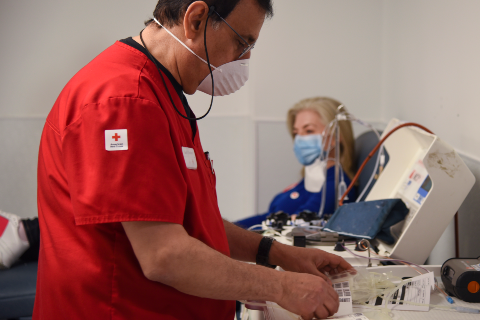 Red Cross volunteer working at blood drive